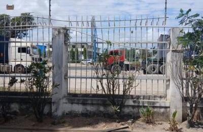 Industrial Property with Yard, Showroom, Offices, Store, and Workshop – Airport Road